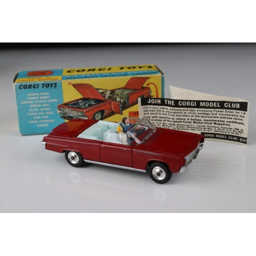 521 - Three boxed Corgi diecast models to include 241 Ghia L6.4 in metallic blue, 314 Ferrari Berlinetta 2... 