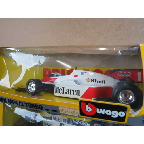 302 - Collection of 15 boxed diecast Burago models, to include Formula 1, sports cars etc, together with s... 