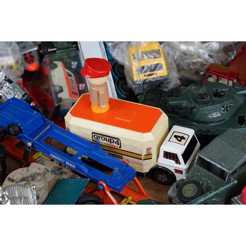 386 - Collection of play worn diecast models to include Corgi, Dinky etc featuring military examples plus ... 