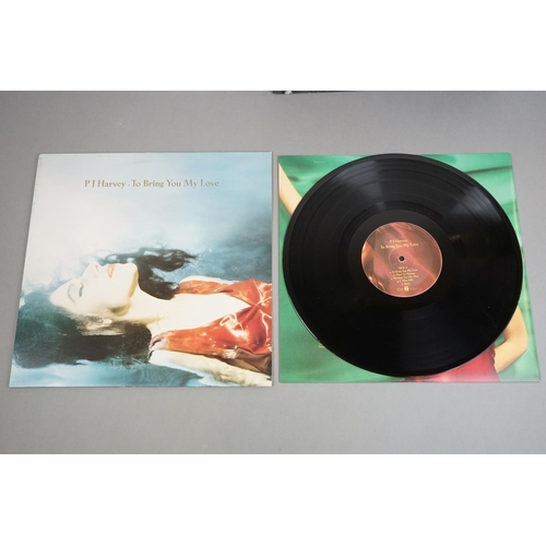 144 - Vinyl - Two PJ Harvey LPs to include To Bring You My Love on Island ILPS8055, with inner sleeve, lar... 