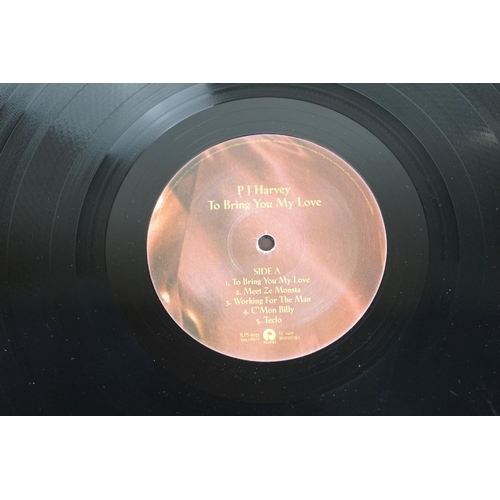 144 - Vinyl - Two PJ Harvey LPs to include To Bring You My Love on Island ILPS8055, with inner sleeve, lar... 