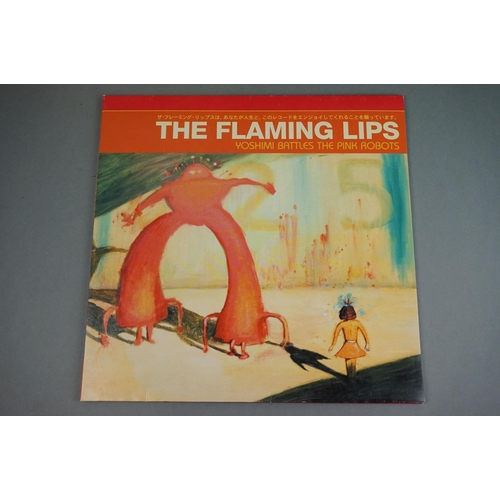 229 - Vinyl - Four original LPs to include EMF Stigma, Spartacus The Farm, The Flaming Lips Yoshimi Battle... 