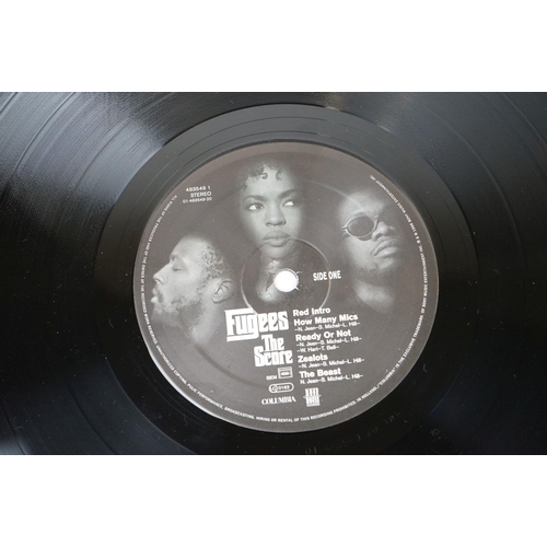 234 - Vinyl - Four LPs to include Macy Gray On How Life Is, Fugees The Score, Money Mark Mark's Keyboard R... 