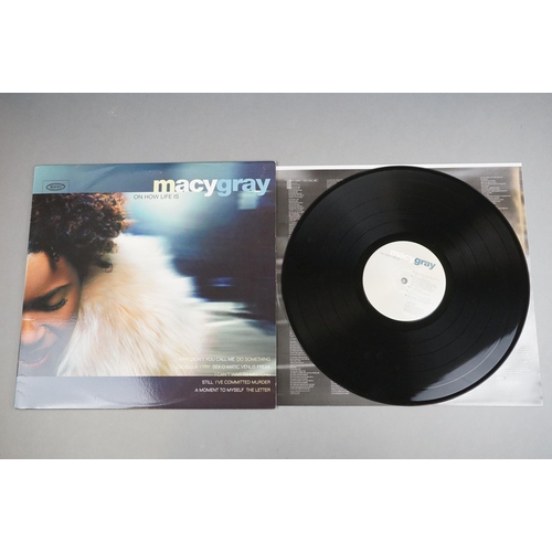 234 - Vinyl - Four LPs to include Macy Gray On How Life Is, Fugees The Score, Money Mark Mark's Keyboard R... 