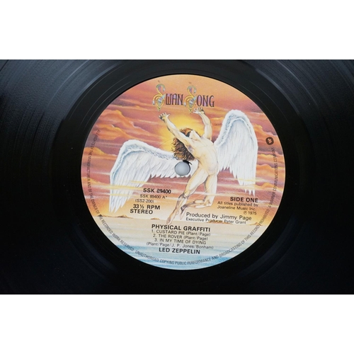 56 - Vinyl - 2 Led Zeppelin LP's to include Four Symbols (2401012) red and purple label with symbols (inv... 