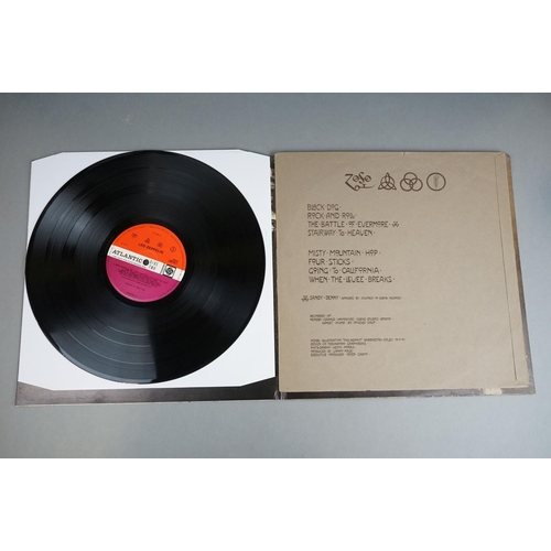 56 - Vinyl - 2 Led Zeppelin LP's to include Four Symbols (2401012) red and purple label with symbols (inv... 