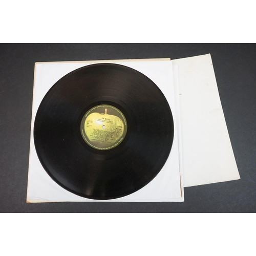 293 - Vinyl - Four The Beatles White Album LPs to include PCS7067 with inserts and poster numbered 0475682... 