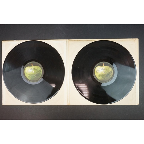 293 - Vinyl - Four The Beatles White Album LPs to include PCS7067 with inserts and poster numbered 0475682... 