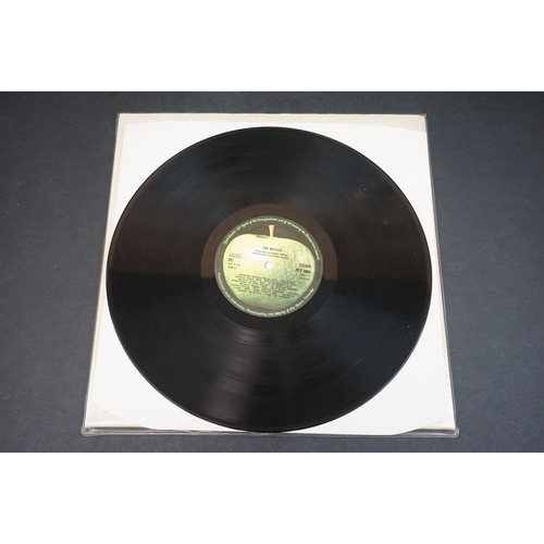 293 - Vinyl - Four The Beatles White Album LPs to include PCS7067 with inserts and poster numbered 0475682... 