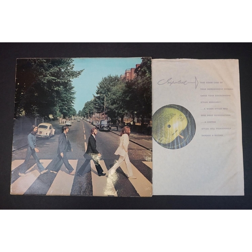 342 - Vinyl - Four The Beatles LPs to include Abbey Road PCS7088, For Sale PMC1240 flip back, Hard Days Ni... 