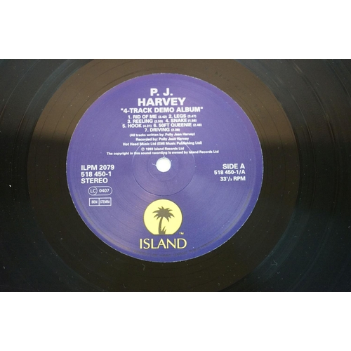 613 - Vinyl - P J Harvey Rid Of Me (ILPS 8002) and 4-Track Demos (ILPM 2079).  Sleeves & Vinyl Vg+