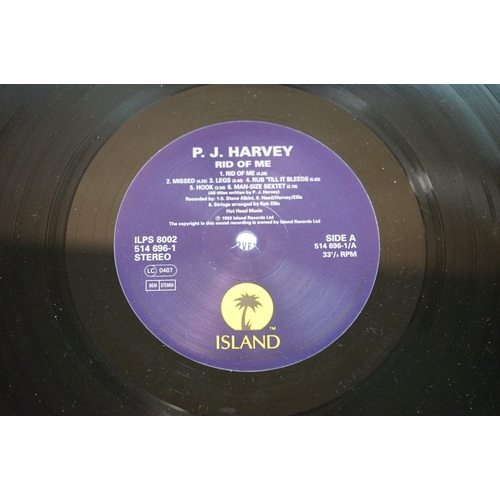 613 - Vinyl - P J Harvey Rid Of Me (ILPS 8002) and 4-Track Demos (ILPM 2079).  Sleeves & Vinyl Vg+