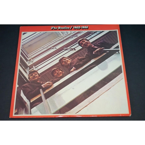 694 - Vinyl - The Beatles 4 LP's to include 1962-66 x 2 (PCSP 717) and 1967-70 x 2 (one French pressing). ... 