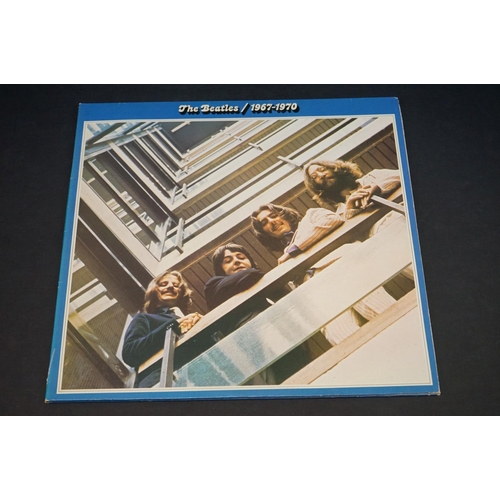 694 - Vinyl - The Beatles 4 LP's to include 1962-66 x 2 (PCSP 717) and 1967-70 x 2 (one French pressing). ... 