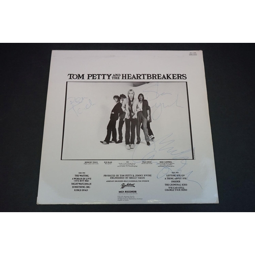 733 - Vinyl & Autographs - Tom Petty & The Heartbreakers 3 LP's to include Damn The Torpedoes (MCF 3044), ... 