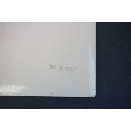 764 - Vinyl - The Beatles White Album (PMC 7067/8) top loader No 0057324 with 4 photos and lyric inners.  ... 