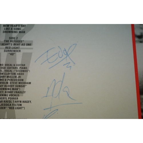 609 - Vinyl & Autographs - U2 3 LP's to include October (ILPS 9680), War (ILPS 9733) and Boy (ILPS 9646). ... 