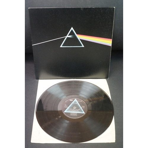 725 - Vinyl - Pink Floyd Dark Side Of The Moon (SHVL 804) x 2 - one with stickered sleeve, one postcard an... 