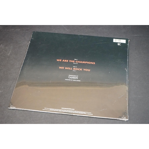 557 - Vinyl - Two sealed recent release records to include Phil Collins Both Sides and Queen We Are The Ch... 