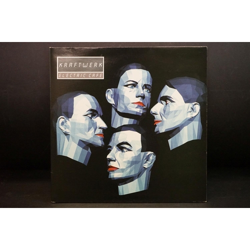 558 - Vinyl - Kraftwerk Electric Cafe EMD 1001 white label.  Sleeve Ex, Vinyl has one small feelable mark ... 