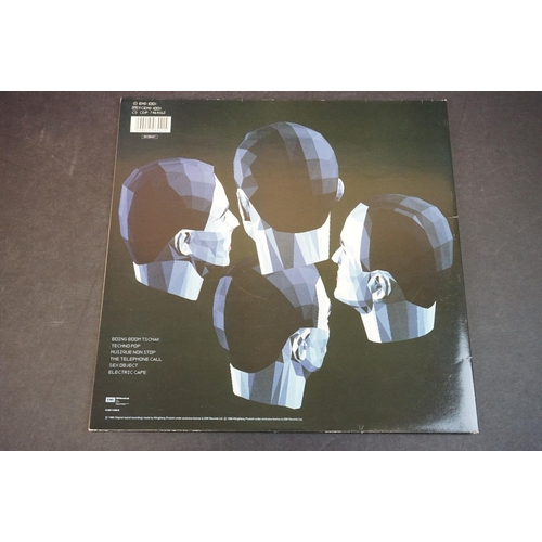 558 - Vinyl - Kraftwerk Electric Cafe EMD 1001 white label.  Sleeve Ex, Vinyl has one small feelable mark ... 