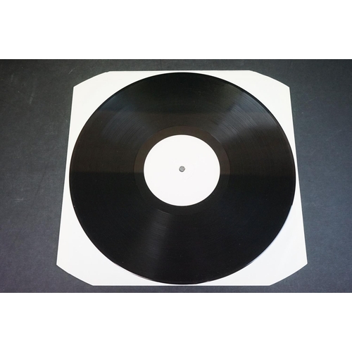 558 - Vinyl - Kraftwerk Electric Cafe EMD 1001 white label.  Sleeve Ex, Vinyl has one small feelable mark ... 