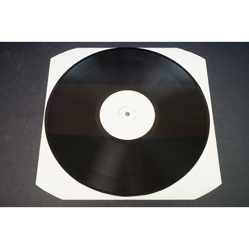 558 - Vinyl - Kraftwerk Electric Cafe EMD 1001 white label.  Sleeve Ex, Vinyl has one small feelable mark ... 