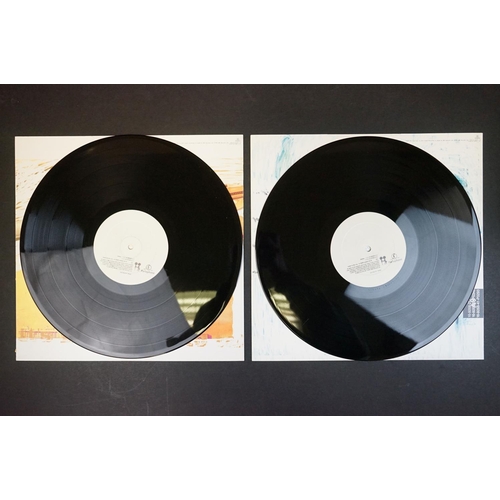 153 - Vinyl - Two Radiohead LPs to include OK Computer 2 LP 8552291 (sleeve white areas a little grubby) a... 