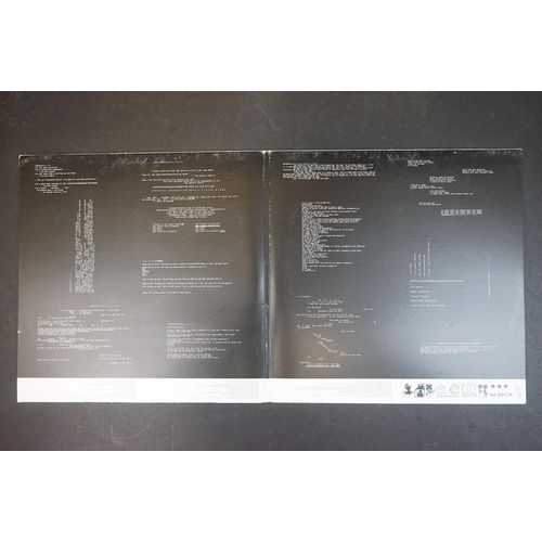 153 - Vinyl - Two Radiohead LPs to include OK Computer 2 LP 8552291 (sleeve white areas a little grubby) a... 