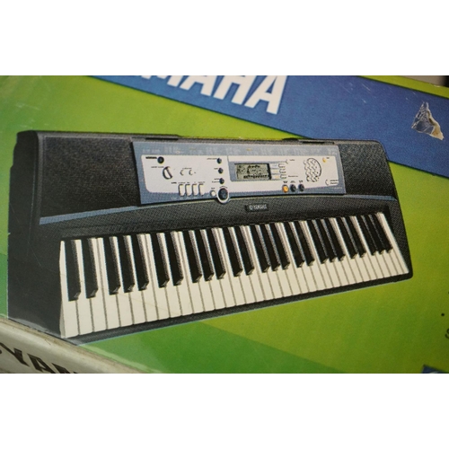 1066 - Boxed Yamaha PSR E213 electric keyboard