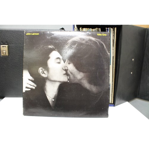 261A - Vinyl - Collection of over 60 LP's in two vintage record cases spanning genres and decades including... 