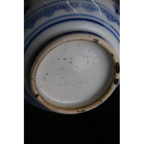 11 - Chinese Blue and White Vase of Baluster form decorated with floral sprays, Kangxi period, 23cms high