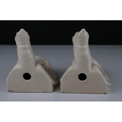 42 - Pair of Art Deco ceramic bookends in the form of seals