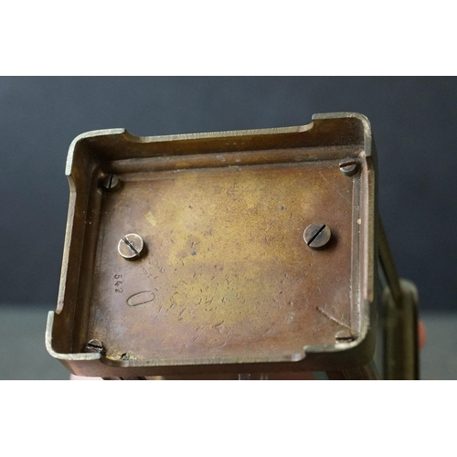 185 - An early 20th century brass cased carriage clock, complete with travel case and key.