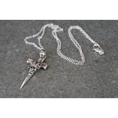 191 - Silver cross necklace with embossed skull decoration