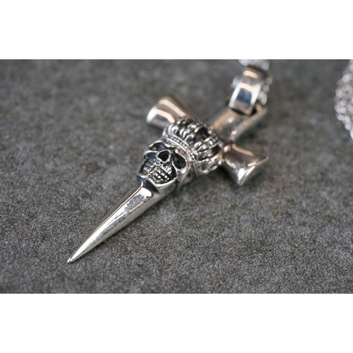 191 - Silver cross necklace with embossed skull decoration