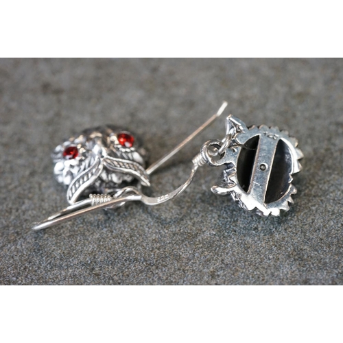 193 - Pair of silver owl earrings with ruby eyes