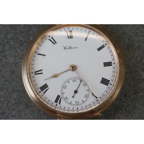 194 - Two early 20th century top winding pocket watches with gold plated cases to include a Waltham exampl... 