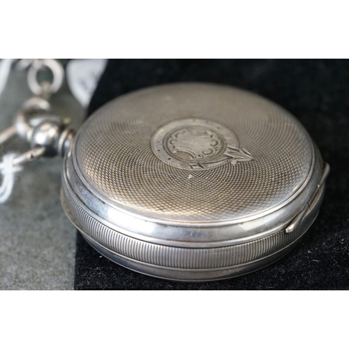 197 - A sterling silver cased gents pocket watch with hallmarked silver graduated Albert chain.