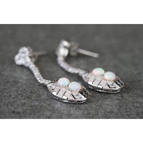 198 - Pair of silver, CZ & opal panelled drop earrings