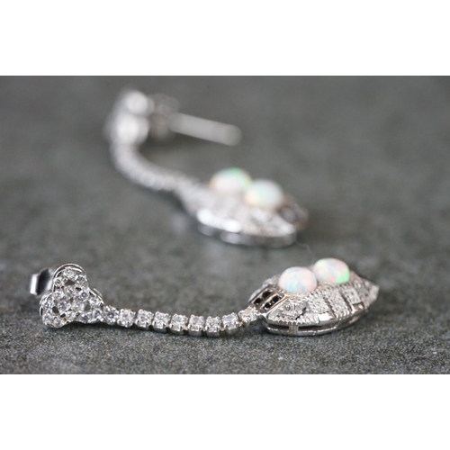 198 - Pair of silver, CZ & opal panelled drop earrings