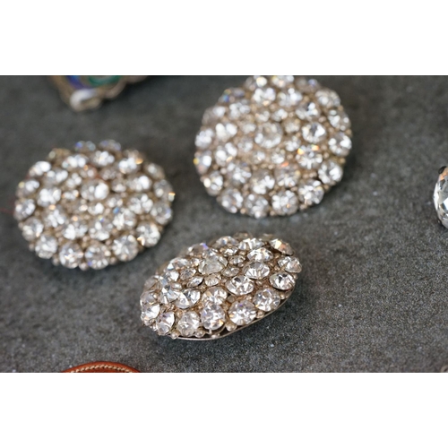 201 - A small collection of asian and islamic jewellery to include enamel examples.