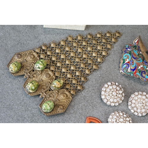 201 - A small collection of asian and islamic jewellery to include enamel examples.