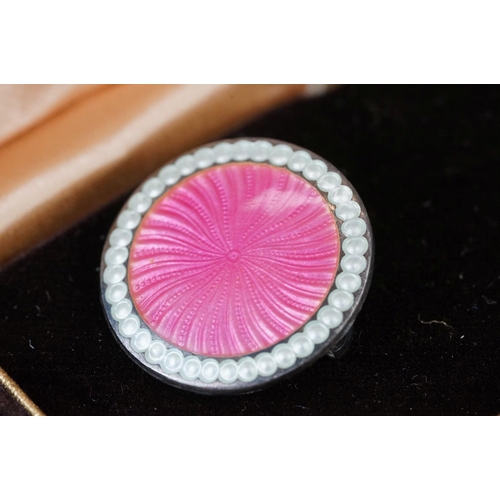 202 - A pair of fully hallmarked sterling silver and pick enamel brooches maker marked JA&S and assay in B... 