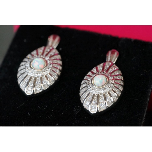 204 - Pair of silver, CZ & opal panelled earrings