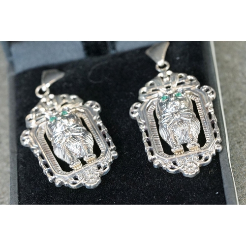 206 - Cased pair of silver cat style earrings