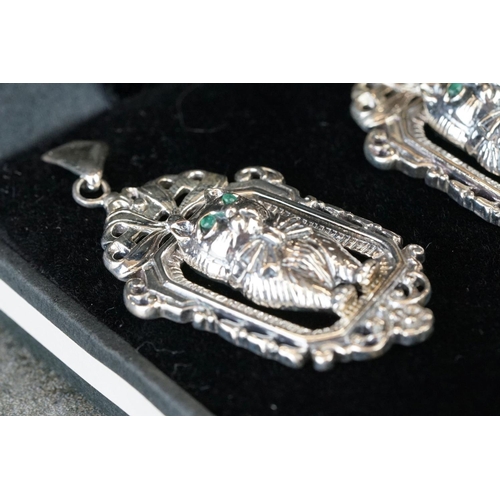 206 - Cased pair of silver cat style earrings
