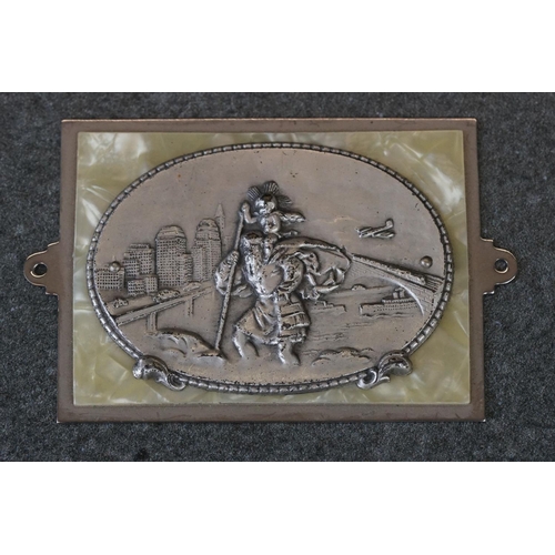 208 - A white metal German St. Christopher plaque together with a silver St. Christopher charm.