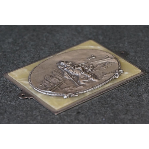 208 - A white metal German St. Christopher plaque together with a silver St. Christopher charm.