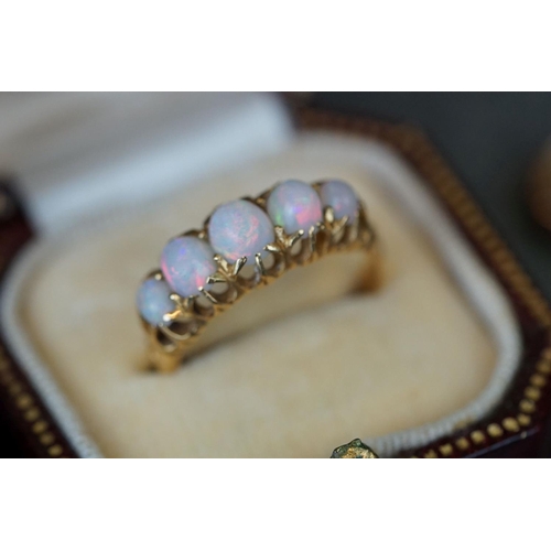 212 - A small quantity of jewellery to include a yellow gold and opal ring together with a 9ct gold and si... 